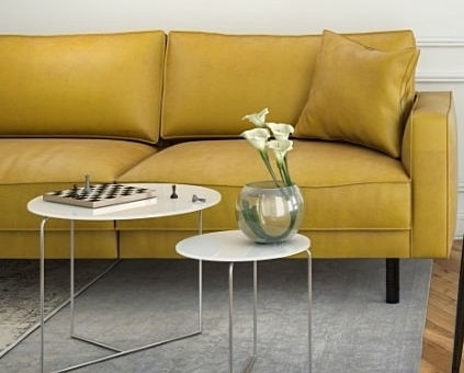 Żółta sofa tapicerowana z poduchami Mellow